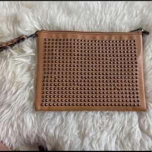 Leather studded clutch